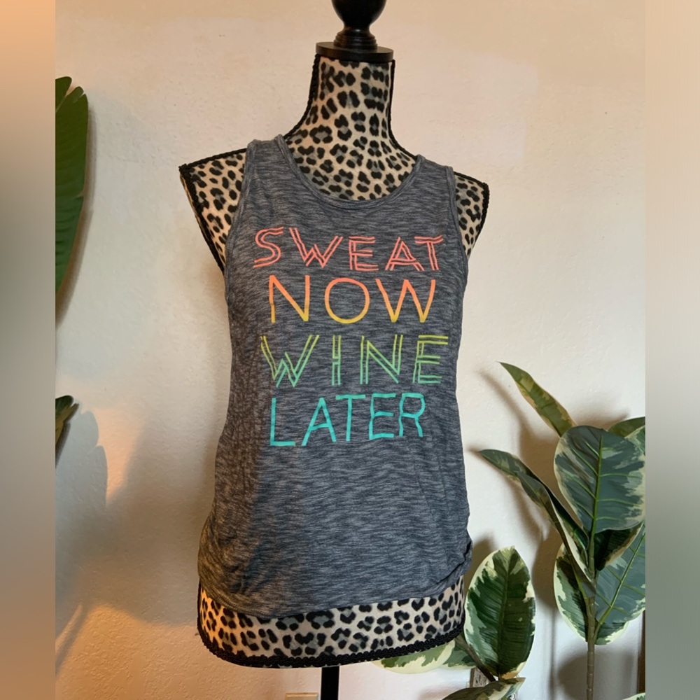 Active wear top. Gray with rainbow lettering
